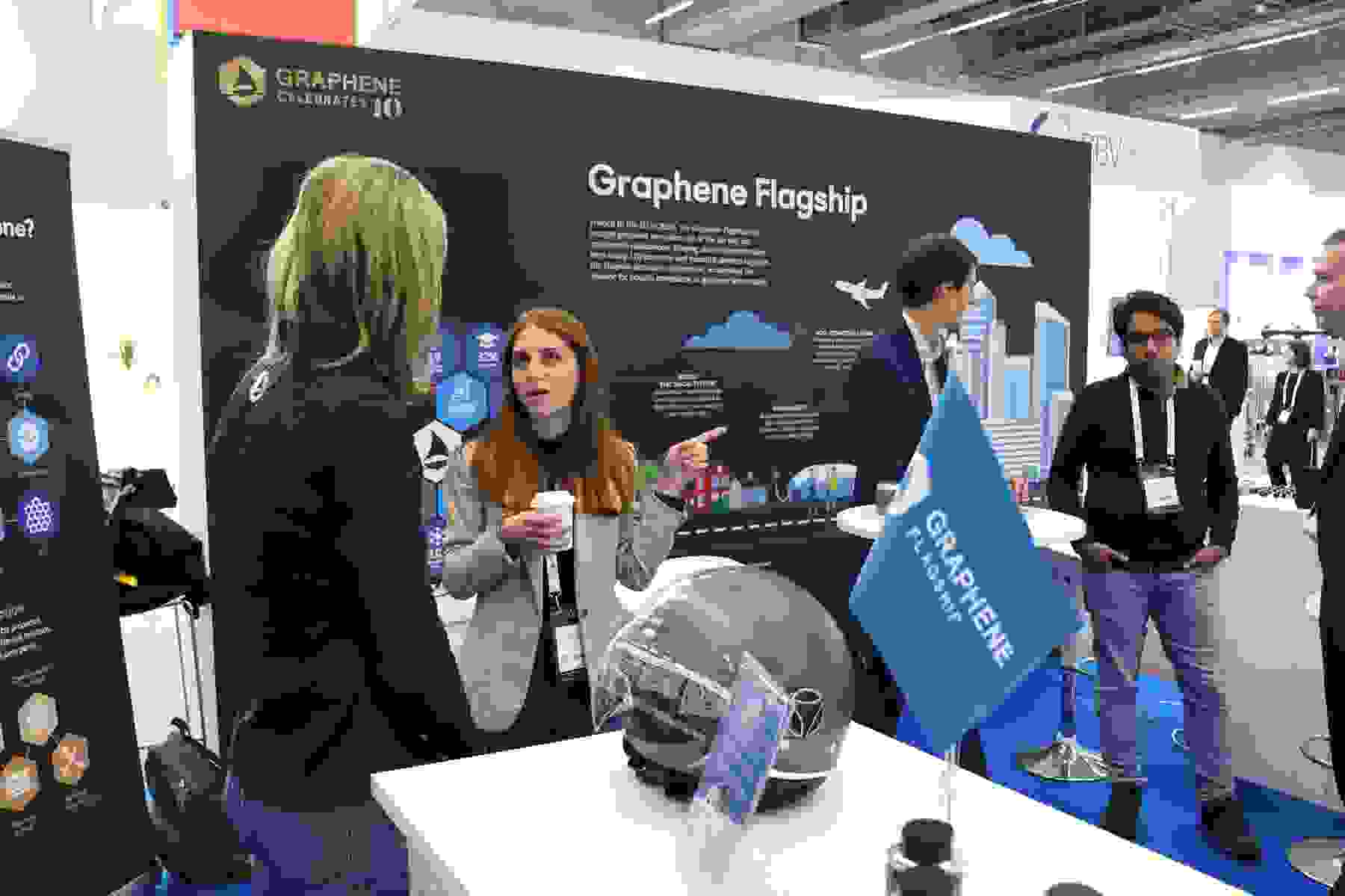 People talking at Graphene Flagship Enlit Europe booth